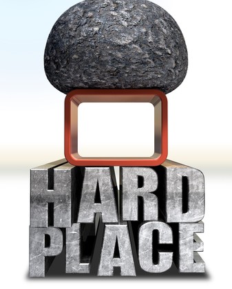 © Albund | Dreamstime.com - Caught Between A Rock And A Hard Place Photo