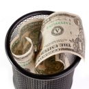© Yurchyk | Dreamstime.com - Dollars In A Trash Bin Photo