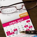 © Steveheap | Dreamstime.com - Gold pen laying on calendar for tax day