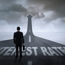 Paulus Rusyanto | Dreamstime.com - Businessman Ready for Higher Interest Rates